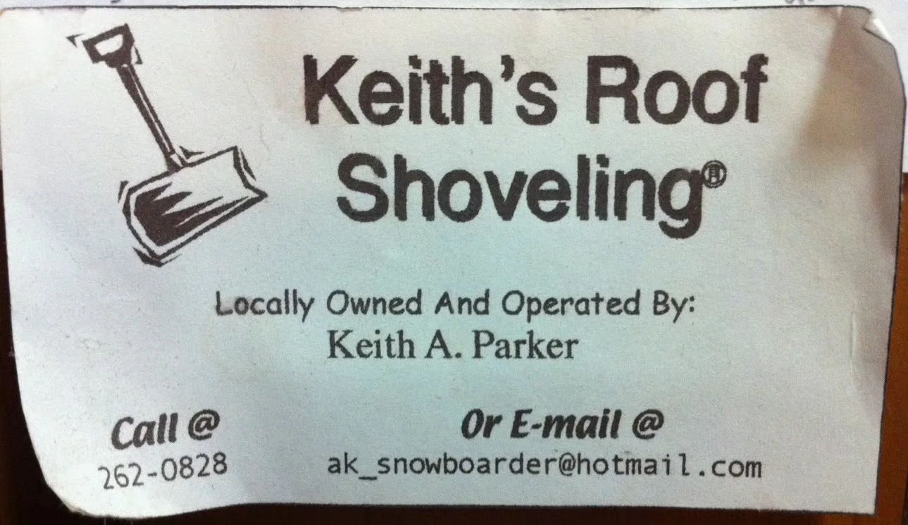 A young person shoveling snow from a roof beside a hand-painted Keith’s Roof Shoveling sign.