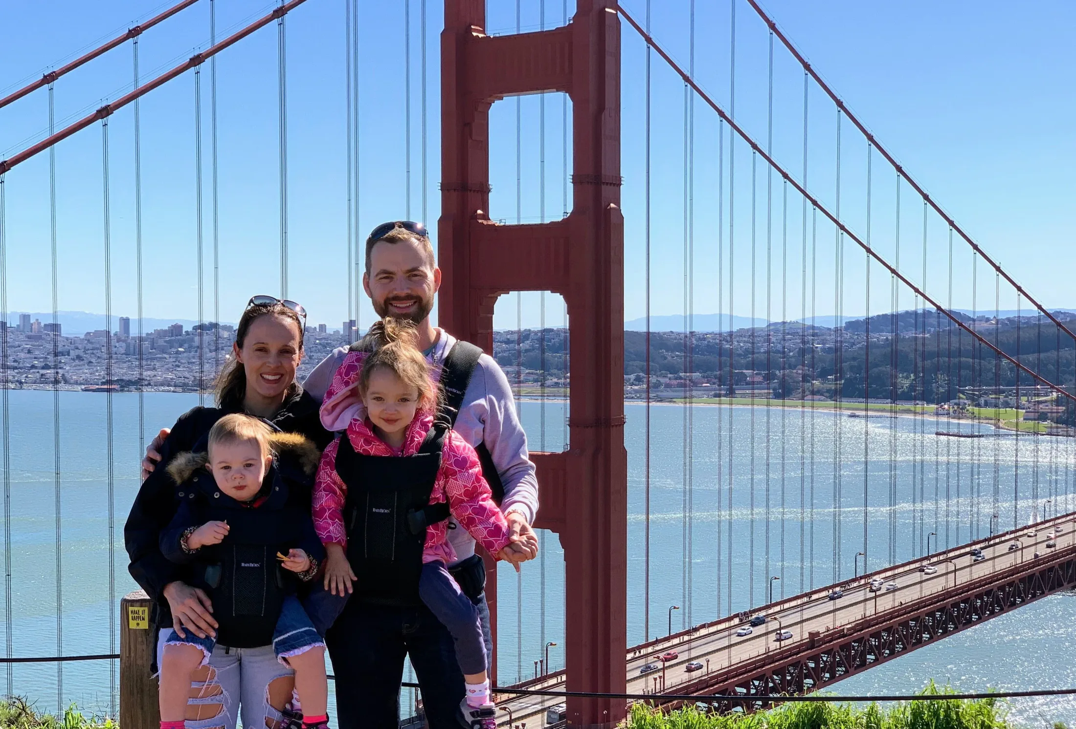 Keith Parker and family standing near the Golden Gate Bridge.